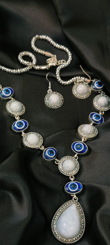 Gauhar Metallic Necklace set with Evil Eye Design from Mrigaya by Nandini - White Silver