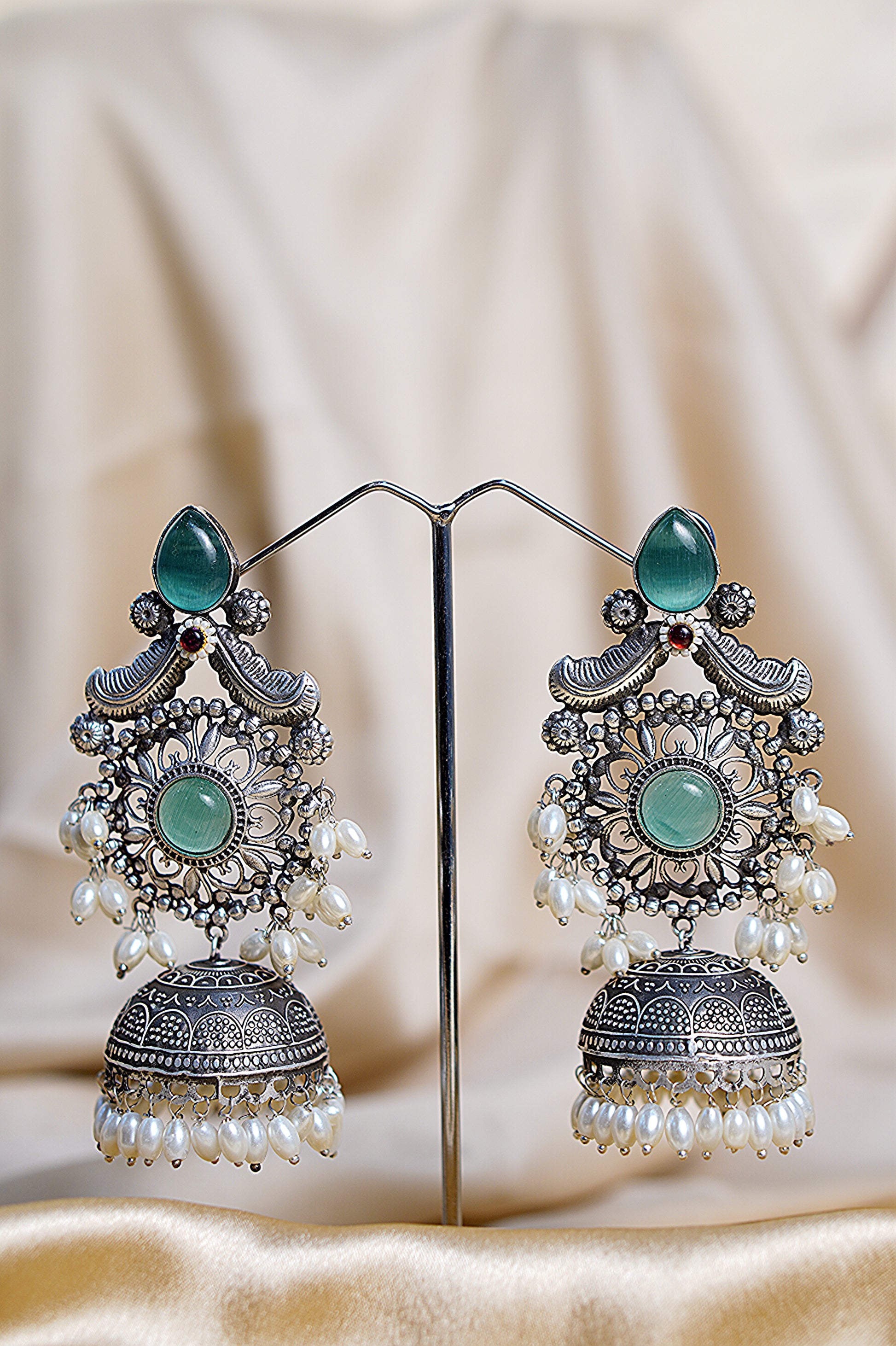 Ratnavati_ Light Weight Heavy-Look Jhumka Collection - Artificial Silver Finish earrings
